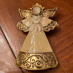 Goldtone scrollwork Angel pin brooch with enameling